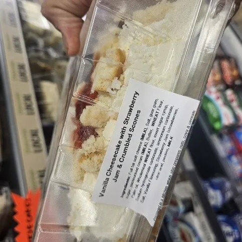 Vanilla Cheesecake with Strawberry jam and Crumbled Scones